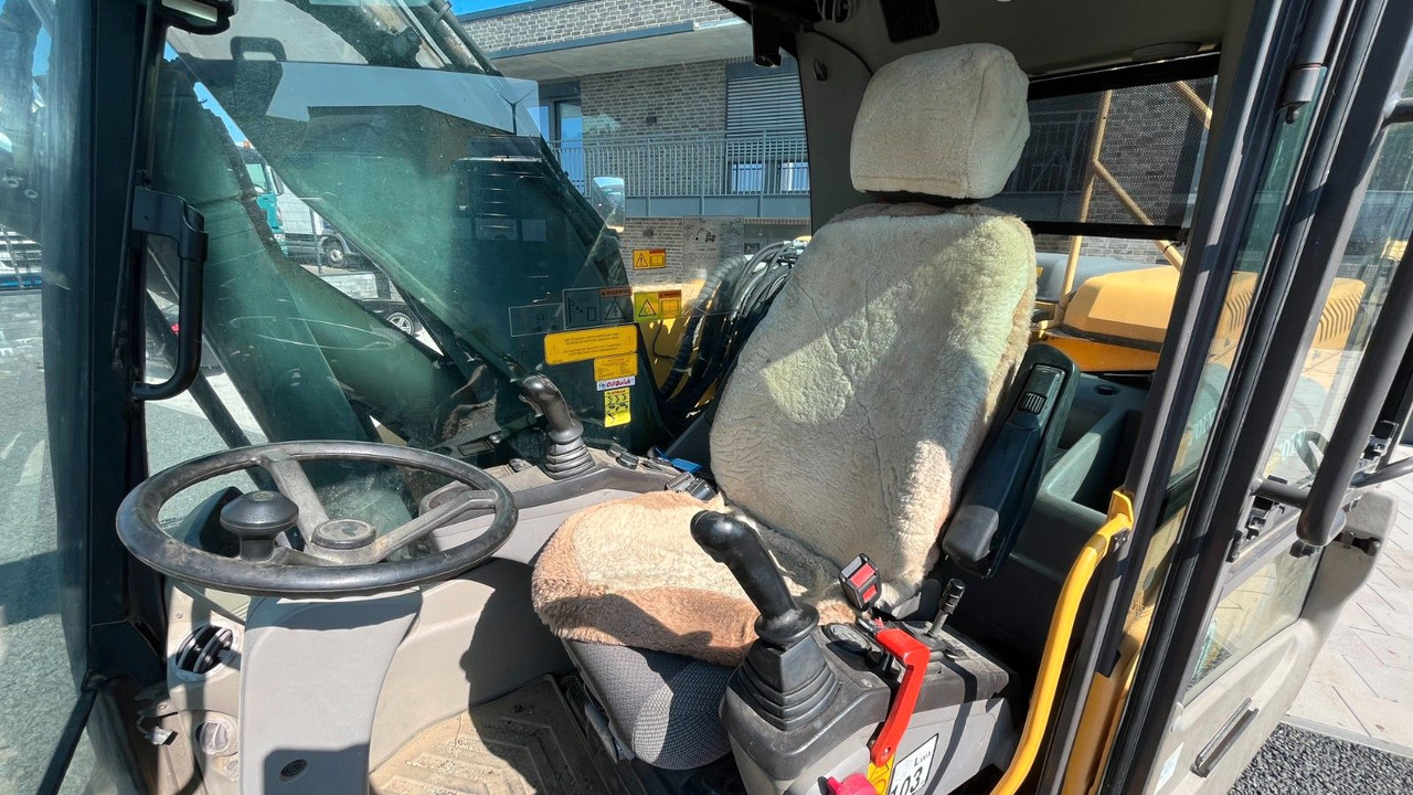 Volvo EW180D 20500 Kg Verstellausleger OilQuick - Bager na kotačima: slika Volvo EW180D 20500 Kg Verstellausleger OilQuick - Bager na kotačima Volvo EW180D 20500 Kg Verstellausleger OilQuick - Bager na kotačima: slika Volvo EW180D 20500 Kg Verstellausleger OilQuick - Bager na kotačima