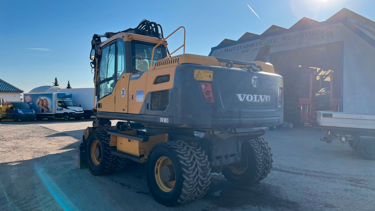 Volvo EW180D 20500 Kg Verstellausleger OilQuick - Bager na kotačima: slika Volvo EW180D 20500 Kg Verstellausleger OilQuick - Bager na kotačima Volvo EW180D 20500 Kg Verstellausleger OilQuick - Bager na kotačima: slika Volvo EW180D 20500 Kg Verstellausleger OilQuick - Bager na kotačima