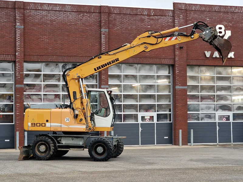 Liebherr A900C - 95 KW - Central Greasing - - Bager na kotačima: slika Liebherr A900C - 95 KW - Central Greasing - - Bager na kotačima Liebherr A900C - 95 KW - Central Greasing - - Bager na kotačima: slika Liebherr A900C - 95 KW - Central Greasing - - Bager na kotačima