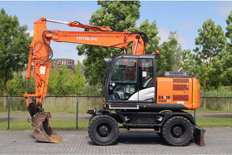 Hitachi ZX 140 W-5B | TILT QC | BUCKET | DOZER BLADE | DUTCH REG. - Bager na kotačima: slika Hitachi ZX 140 W-5B | TILT QC | BUCKET | DOZER BLADE | DUTCH REG. - Bager na kotačima Hitachi ZX 140 W-5B | TILT QC | BUCKET | DOZER BLADE | DUTCH REG. - Bager na kotačima: slika Hitachi ZX 140 W-5B | TILT QC | BUCKET | DOZER BLADE | DUTCH REG. - Bager na kotačima