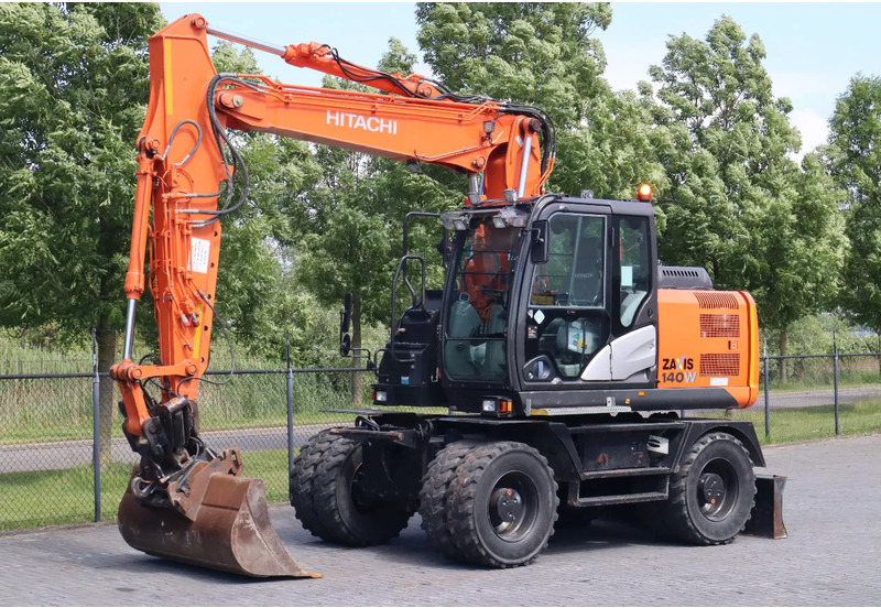 Hitachi ZX 140 W-5B | TILT QC | BUCKET | DOZER BLADE | DUTCH REG. - Bager na kotačima: slika Hitachi ZX 140 W-5B | TILT QC | BUCKET | DOZER BLADE | DUTCH REG. - Bager na kotačima Hitachi ZX 140 W-5B | TILT QC | BUCKET | DOZER BLADE | DUTCH REG. - Bager na kotačima: slika Hitachi ZX 140 W-5B | TILT QC | BUCKET | DOZER BLADE | DUTCH REG. - Bager na kotačima