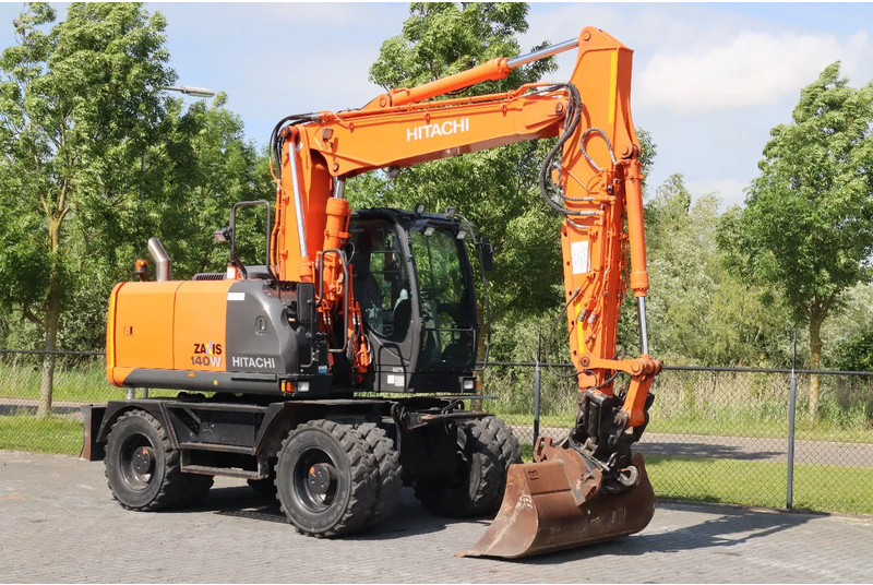 Hitachi ZX 140 W-5B | TILT QC | BUCKET | DOZER BLADE | DUTCH REG. - Bager na kotačima: slika Hitachi ZX 140 W-5B | TILT QC | BUCKET | DOZER BLADE | DUTCH REG. - Bager na kotačima Hitachi ZX 140 W-5B | TILT QC | BUCKET | DOZER BLADE | DUTCH REG. - Bager na kotačima: slika Hitachi ZX 140 W-5B | TILT QC | BUCKET | DOZER BLADE | DUTCH REG. - Bager na kotačima