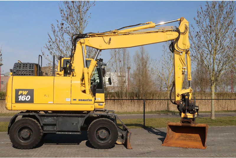 Komatsu PW160-11 | ENGCON TILTROTATOR | BUCKET | TRAILER HYDR. - Bager na kotačima: slika Komatsu PW160-11 | ENGCON TILTROTATOR | BUCKET | TRAILER HYDR. - Bager na kotačima Komatsu PW160-11 | ENGCON TILTROTATOR | BUCKET | TRAILER HYDR. - Bager na kotačima: slika Komatsu PW160-11 | ENGCON TILTROTATOR | BUCKET | TRAILER HYDR. - Bager na kotačima