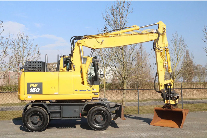 Komatsu PW160-11 | ENGCON TILTROTATOR | BUCKET | TRAILER HYDR. - Bager na kotačima: slika Komatsu PW160-11 | ENGCON TILTROTATOR | BUCKET | TRAILER HYDR. - Bager na kotačima Komatsu PW160-11 | ENGCON TILTROTATOR | BUCKET | TRAILER HYDR. - Bager na kotačima: slika Komatsu PW160-11 | ENGCON TILTROTATOR | BUCKET | TRAILER HYDR. - Bager na kotačima