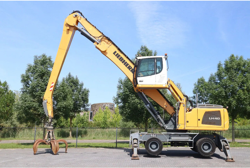 Liebherr LH 40 M LITRONIC | GRAB | QUICK COUPLER | 16 METER - Bager na kotačima: slika Liebherr LH 40 M LITRONIC | GRAB | QUICK COUPLER | 16 METER - Bager na kotačima Liebherr LH 40 M LITRONIC | GRAB | QUICK COUPLER | 16 METER - Bager na kotačima: slika Liebherr LH 40 M LITRONIC | GRAB | QUICK COUPLER | 16 METER - Bager na kotačima