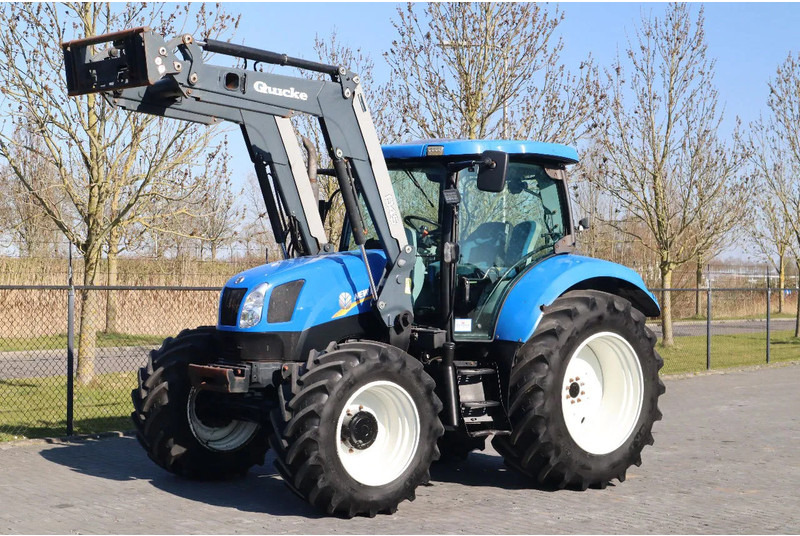 New Holland T6040 | FRONT LOADER | 50KM/H | QUICK COUPLER - Traktor: slika New Holland T6040 | FRONT LOADER | 50KM/H | QUICK COUPLER - Traktor New Holland T6040 | FRONT LOADER | 50KM/H | QUICK COUPLER - Traktor: slika New Holland T6040 | FRONT LOADER | 50KM/H | QUICK COUPLER - Traktor