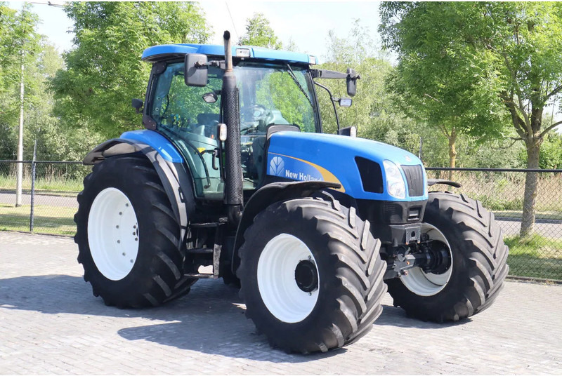 New Holland TS135A | 40 KM/H | 4X4 | SUPERSTEER - Traktor: slika New Holland TS135A | 40 KM/H | 4X4 | SUPERSTEER - Traktor New Holland TS135A | 40 KM/H | 4X4 | SUPERSTEER - Traktor: slika New Holland TS135A | 40 KM/H | 4X4 | SUPERSTEER - Traktor
