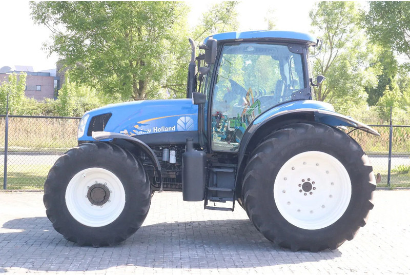 New Holland TS135A | 40 KM/H | 4X4 | SUPERSTEER - Traktor: slika New Holland TS135A | 40 KM/H | 4X4 | SUPERSTEER - Traktor New Holland TS135A | 40 KM/H | 4X4 | SUPERSTEER - Traktor: slika New Holland TS135A | 40 KM/H | 4X4 | SUPERSTEER - Traktor