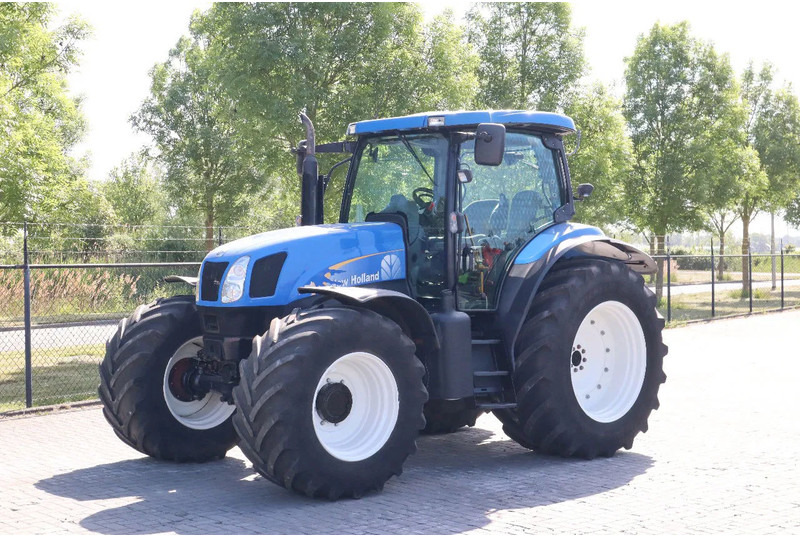 New Holland TS135A | 40 KM/H | 4X4 | SUPERSTEER - Traktor: slika New Holland TS135A | 40 KM/H | 4X4 | SUPERSTEER - Traktor New Holland TS135A | 40 KM/H | 4X4 | SUPERSTEER - Traktor: slika New Holland TS135A | 40 KM/H | 4X4 | SUPERSTEER - Traktor