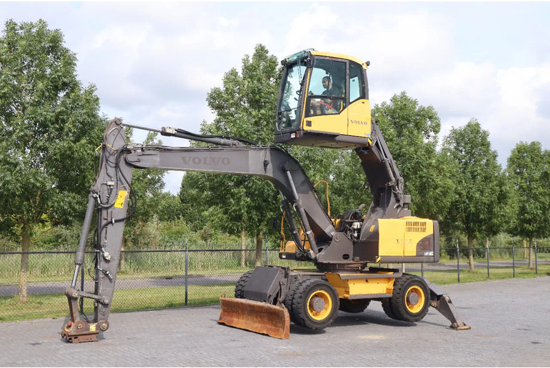 Volvo EW160 C | QUICK COUPLER | ELEVATING CABIN | UMSCHLAG - Stroj za rukovanje otpadom: slika Volvo EW160 C | QUICK COUPLER | ELEVATING CABIN | UMSCHLAG - Stroj za rukovanje otpadom Volvo EW160 C | QUICK COUPLER | ELEVATING CABIN | UMSCHLAG - Stroj za rukovanje otpadom: slika Volvo EW160 C | QUICK COUPLER | ELEVATING CABIN | UMSCHLAG - Stroj za rukovanje otpadom