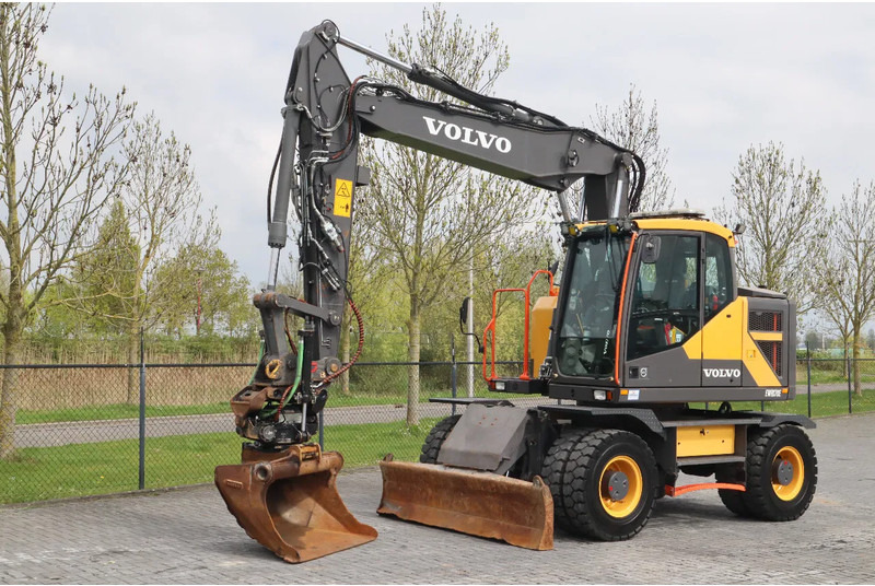 Volvo EWR 170 E | ROTOTILT | BUCKET | DOZERBLADE | TRAILER HYDR - Bager na kotačima: slika Volvo EWR 170 E | ROTOTILT | BUCKET | DOZERBLADE | TRAILER HYDR - Bager na kotačima Volvo EWR 170 E | ROTOTILT | BUCKET | DOZERBLADE | TRAILER HYDR - Bager na kotačima: slika Volvo EWR 170 E | ROTOTILT | BUCKET | DOZERBLADE | TRAILER HYDR - Bager na kotačima