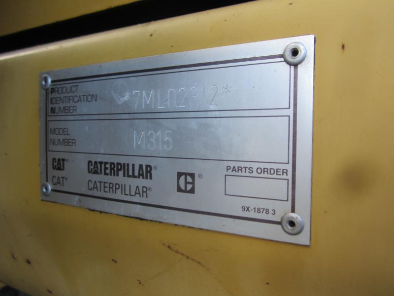 Caterpillar M315 - Bager na kotačima: slika Caterpillar M315 - Bager na kotačima Caterpillar M315 - Bager na kotačima: slika Caterpillar M315 - Bager na kotačima