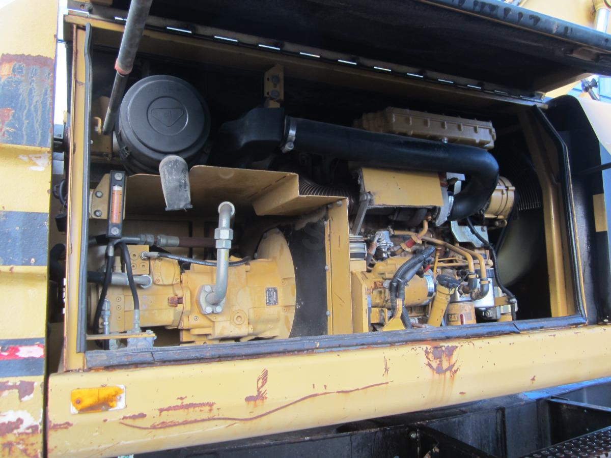Caterpillar M315 - Bager na kotačima: slika Caterpillar M315 - Bager na kotačima Caterpillar M315 - Bager na kotačima: slika Caterpillar M315 - Bager na kotačima