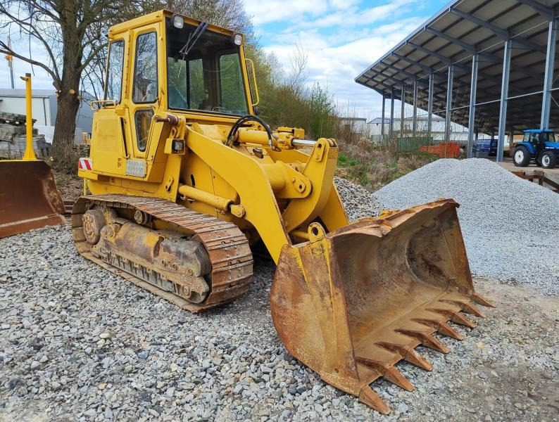 Caterpillar 943 - Utovarivač gusjeničar: slika Caterpillar 943 - Utovarivač gusjeničar Caterpillar 943 - Utovarivač gusjeničar: slika Caterpillar 943 - Utovarivač gusjeničar