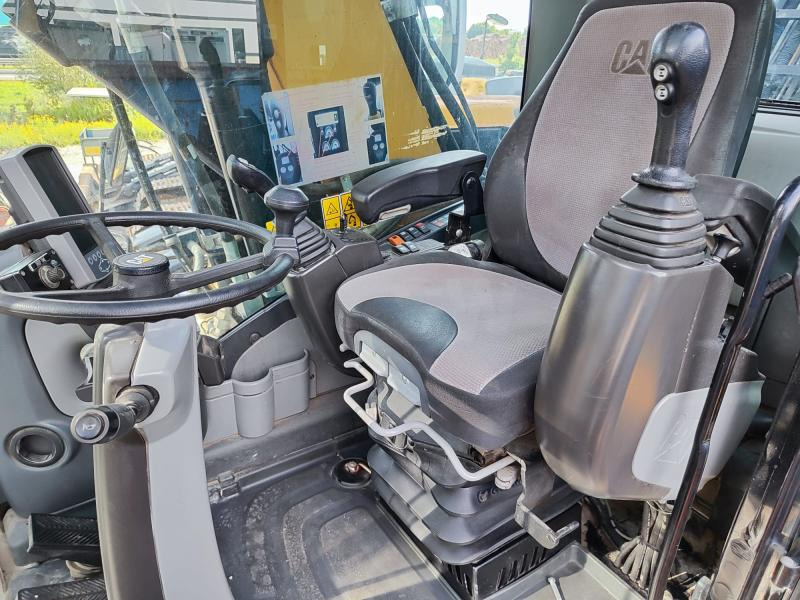 Caterpillar M318D MH - Bager na kotačima: slika Caterpillar M318D MH - Bager na kotačima Caterpillar M318D MH - Bager na kotačima: slika Caterpillar M318D MH - Bager na kotačima