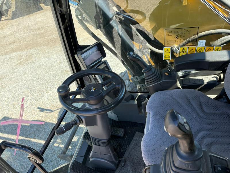 Caterpillar M318F - Bager na kotačima: slika Caterpillar M318F - Bager na kotačima Caterpillar M318F - Bager na kotačima: slika Caterpillar M318F - Bager na kotačima