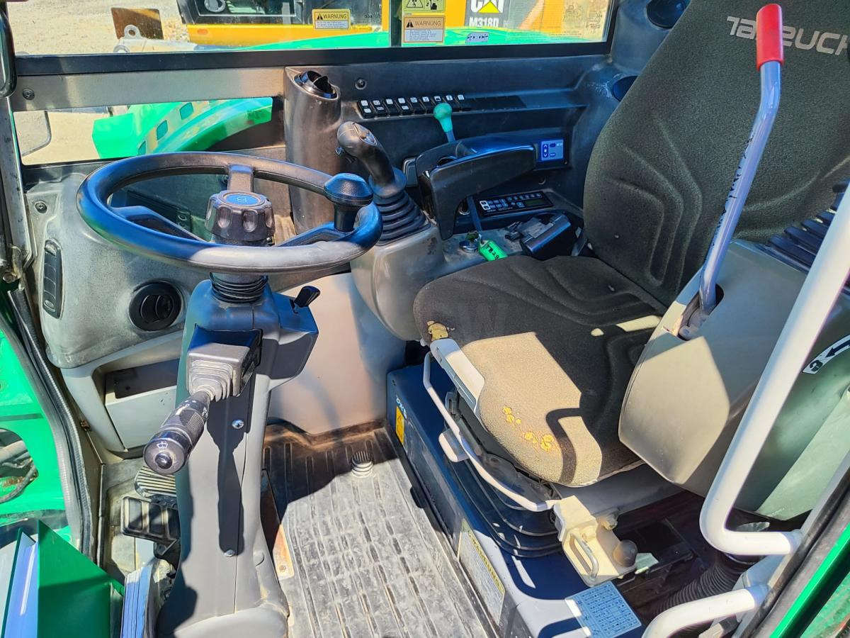 Takeuchi TB295W - Bager na kotačima: slika Takeuchi TB295W - Bager na kotačima Takeuchi TB295W - Bager na kotačima: slika Takeuchi TB295W - Bager na kotačima