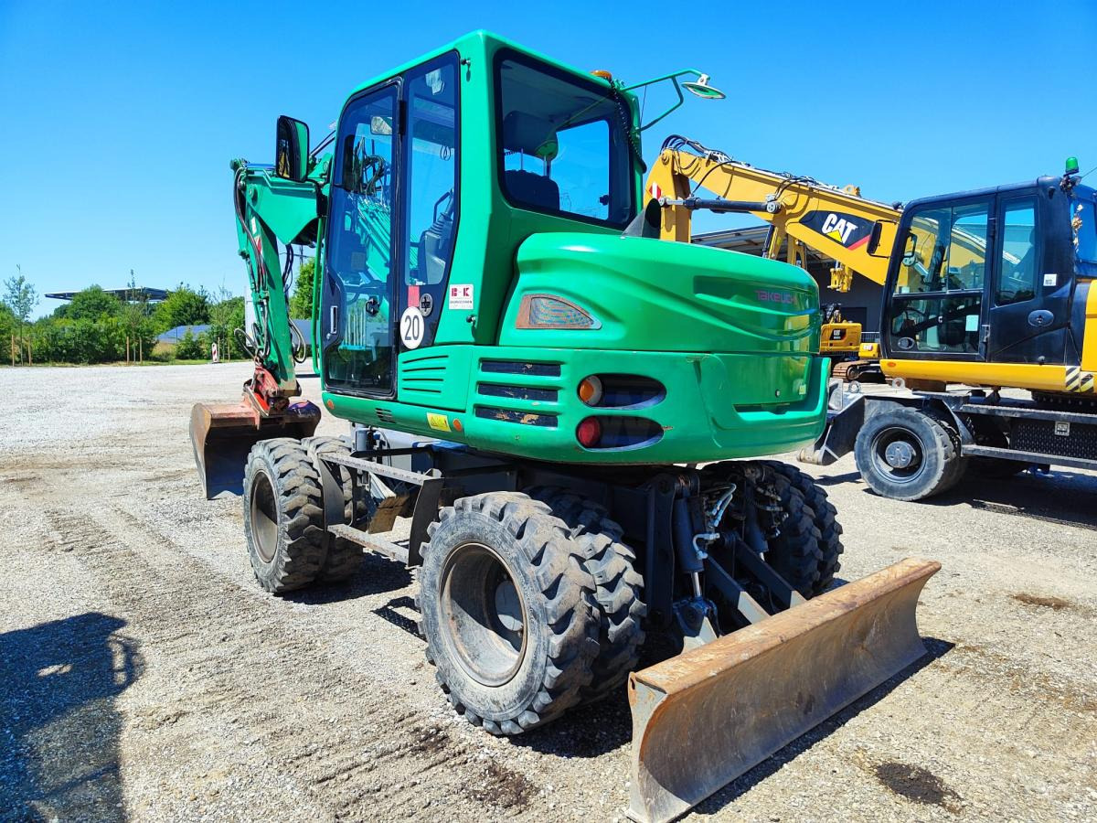 Takeuchi TB295W - Bager na kotačima: slika Takeuchi TB295W - Bager na kotačima Takeuchi TB295W - Bager na kotačima: slika Takeuchi TB295W - Bager na kotačima