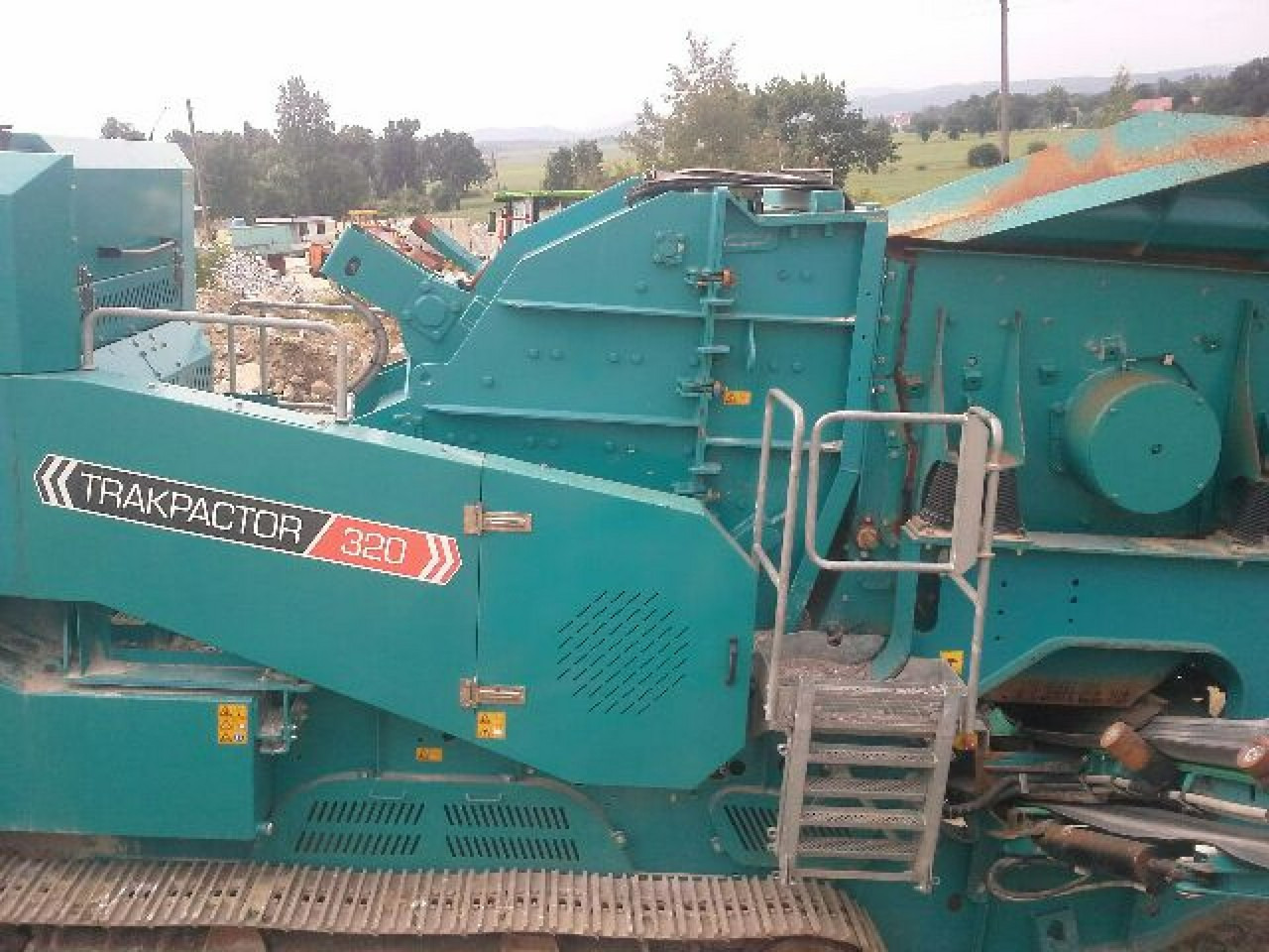 Extec PowerScreen Trakpactor 320 CR 027 Wydajność nawet do 320t/h - Udarna drobilica: slika Extec PowerScreen Trakpactor 320 CR 027 Wydajność nawet do 320t/h - Udarna drobilica Extec PowerScreen Trakpactor 320 CR 027 Wydajność nawet do 320t/h - Udarna drobilica: slika Extec PowerScreen Trakpactor 320 CR 027 Wydajność nawet do 320t/h - Udarna drobilica