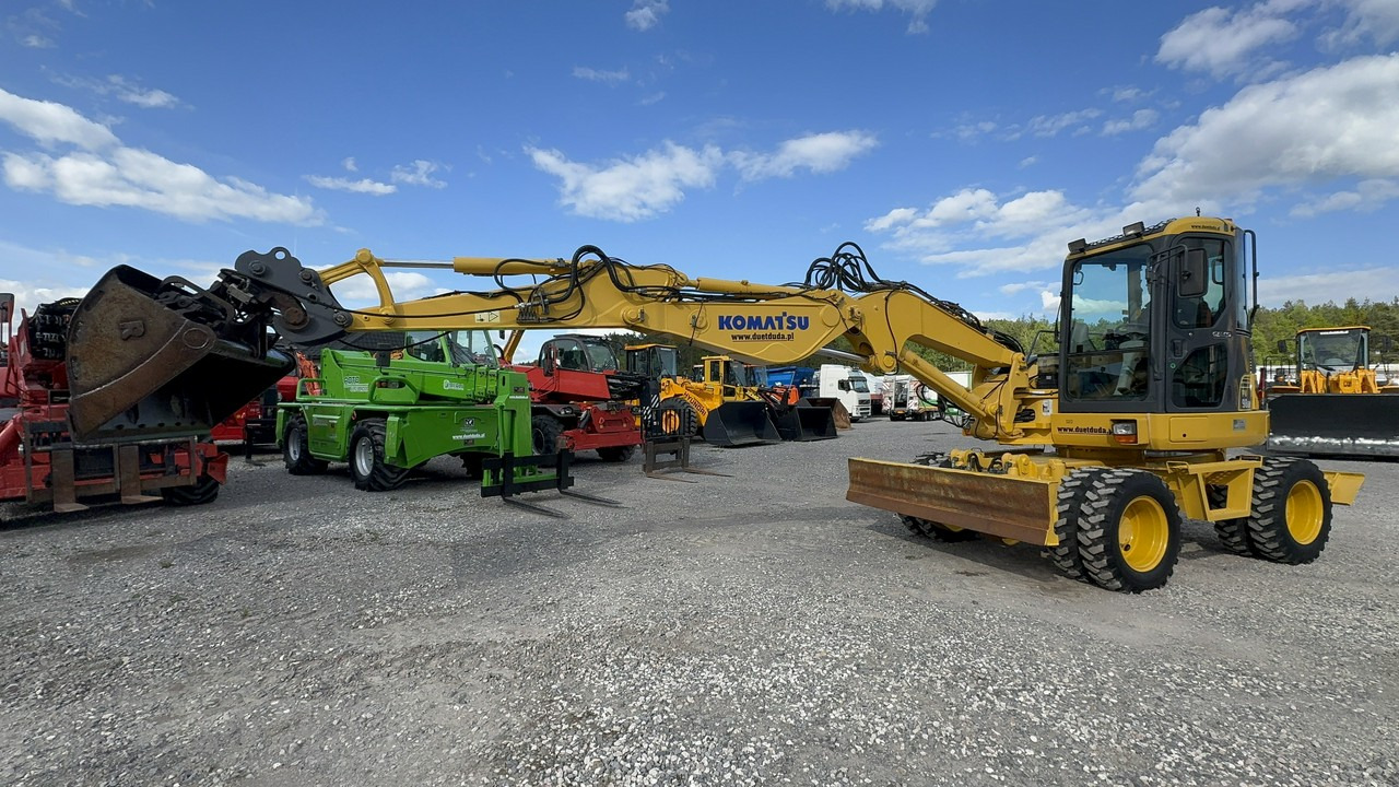 Komatsu PW 98 MR 8 Pług + Podpory 10ton Szybkozłącze - Bager na kotačima: slika Komatsu PW 98 MR 8 Pług + Podpory 10ton Szybkozłącze - Bager na kotačima Komatsu PW 98 MR 8 Pług + Podpory 10ton Szybkozłącze - Bager na kotačima: slika Komatsu PW 98 MR 8 Pług + Podpory 10ton Szybkozłącze - Bager na kotačima