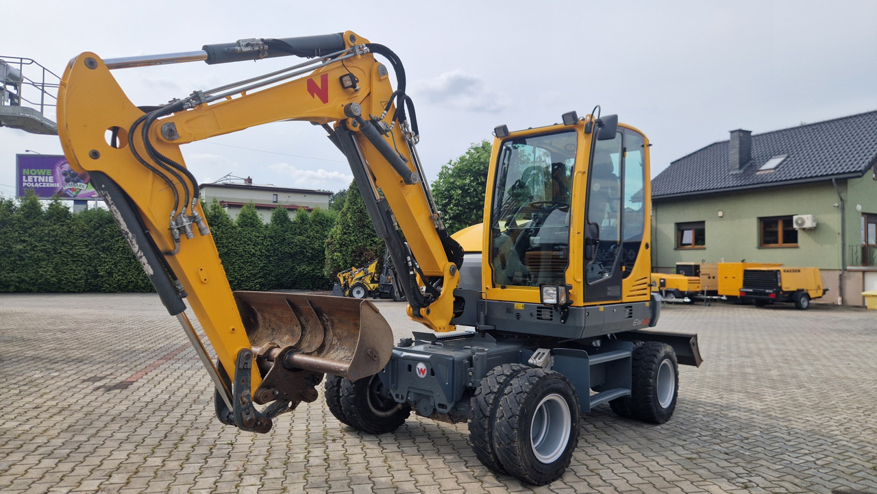 WACKER NEUSON EW65 - Bager na kotačima: slika WACKER NEUSON EW65 - Bager na kotačima WACKER NEUSON EW65 - Bager na kotačima: slika WACKER NEUSON EW65 - Bager na kotačima