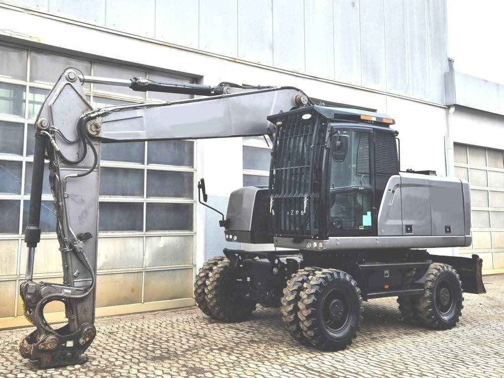 CAT M 320 F - Bager na kotačima: slika CAT M 320 F - Bager na kotačima CAT M 320 F - Bager na kotačima: slika CAT M 320 F - Bager na kotačima