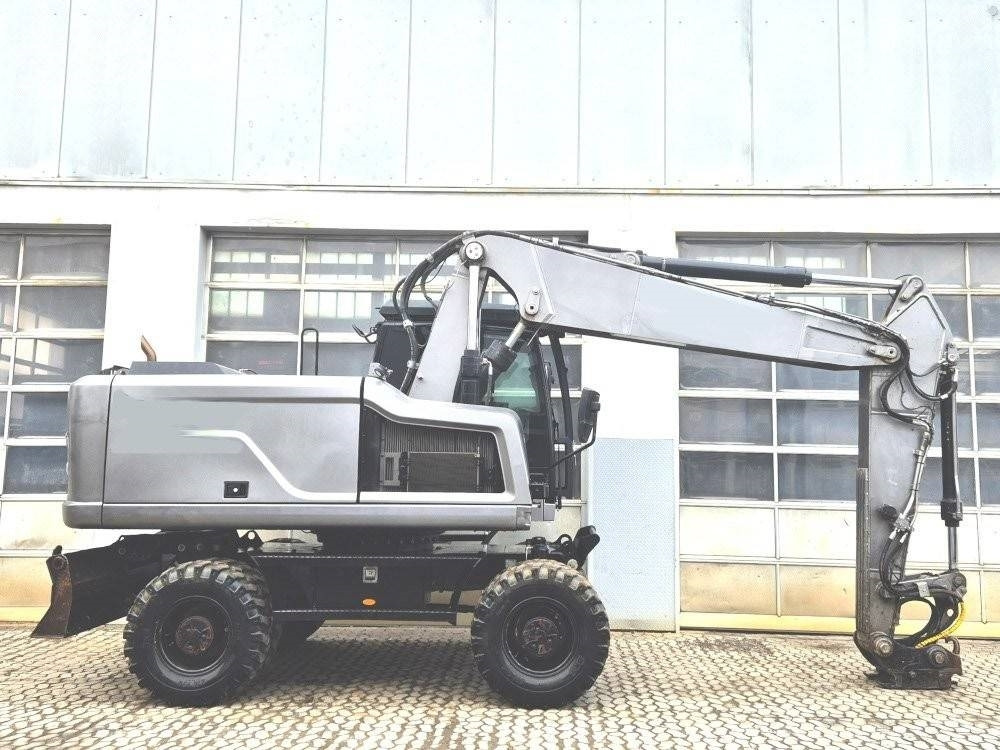 CAT M 320 F - Bager na kotačima: slika CAT M 320 F - Bager na kotačima CAT M 320 F - Bager na kotačima: slika CAT M 320 F - Bager na kotačima