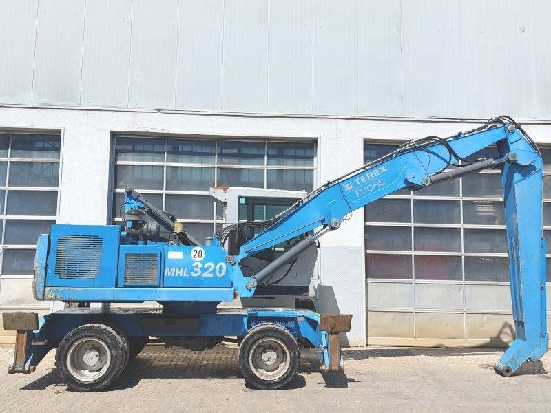 Fuchs MHL 320 - Stroj za rukovanje otpadom: slika Fuchs MHL 320 - Stroj za rukovanje otpadom Fuchs MHL 320 - Stroj za rukovanje otpadom: slika Fuchs MHL 320 - Stroj za rukovanje otpadom