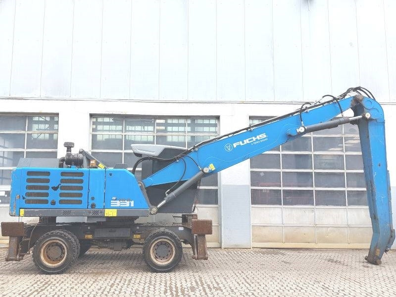Fuchs MHL 331 F - Stroj za rukovanje otpadom: slika Fuchs MHL 331 F - Stroj za rukovanje otpadom Fuchs MHL 331 F - Stroj za rukovanje otpadom: slika Fuchs MHL 331 F - Stroj za rukovanje otpadom