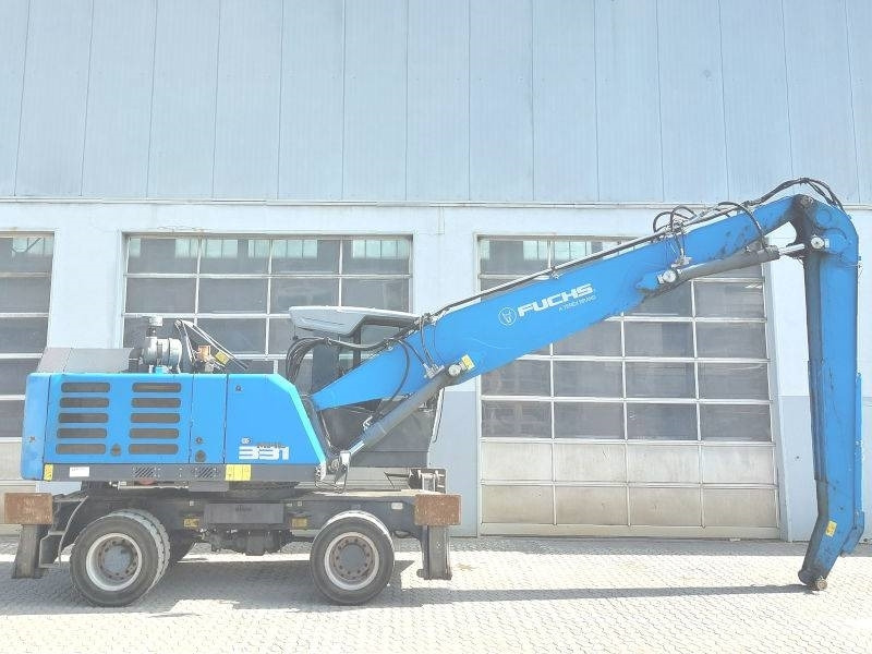 Fuchs MHL 331 F - Stroj za rukovanje otpadom: slika Fuchs MHL 331 F - Stroj za rukovanje otpadom Fuchs MHL 331 F - Stroj za rukovanje otpadom: slika Fuchs MHL 331 F - Stroj za rukovanje otpadom