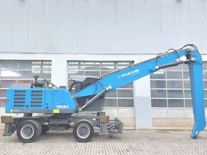 Fuchs MHL 331 F - Stroj za rukovanje otpadom: slika Fuchs MHL 331 F - Stroj za rukovanje otpadom Fuchs MHL 331 F - Stroj za rukovanje otpadom: slika Fuchs MHL 331 F - Stroj za rukovanje otpadom