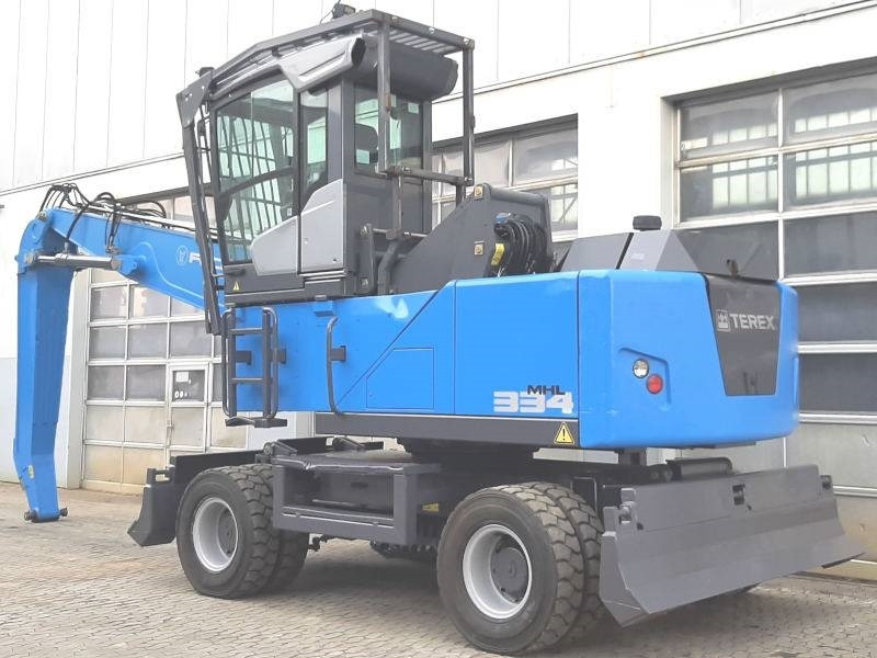 Fuchs MHL 334 F - Stroj za rukovanje otpadom: slika Fuchs MHL 334 F - Stroj za rukovanje otpadom Fuchs MHL 334 F - Stroj za rukovanje otpadom: slika Fuchs MHL 334 F - Stroj za rukovanje otpadom