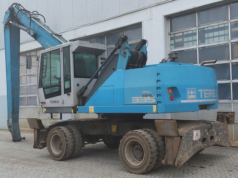 Fuchs MHL 335 E - Stroj za rukovanje otpadom: slika Fuchs MHL 335 E - Stroj za rukovanje otpadom Fuchs MHL 335 E - Stroj za rukovanje otpadom: slika Fuchs MHL 335 E - Stroj za rukovanje otpadom