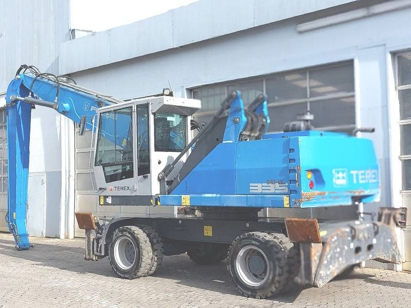 Fuchs MHL 335 E - Stroj za rukovanje otpadom: slika Fuchs MHL 335 E - Stroj za rukovanje otpadom Fuchs MHL 335 E - Stroj za rukovanje otpadom: slika Fuchs MHL 335 E - Stroj za rukovanje otpadom