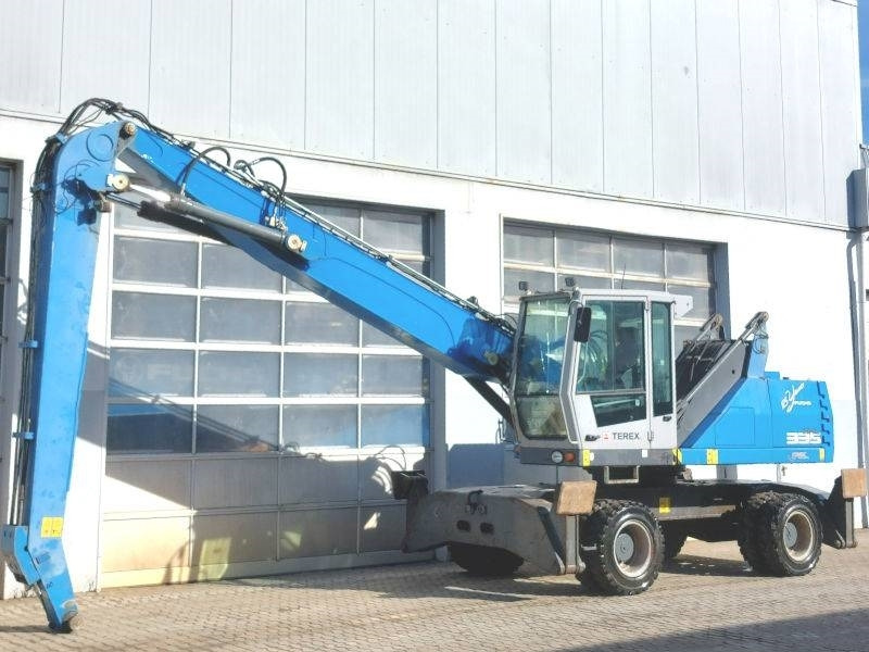 Fuchs MHL 335 E - Stroj za rukovanje otpadom: slika Fuchs MHL 335 E - Stroj za rukovanje otpadom Fuchs MHL 335 E - Stroj za rukovanje otpadom: slika Fuchs MHL 335 E - Stroj za rukovanje otpadom