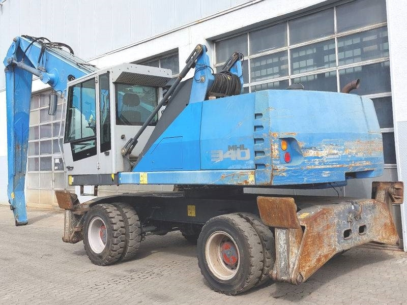 Fuchs MHL 340 E - Stroj za rukovanje otpadom: slika Fuchs MHL 340 E - Stroj za rukovanje otpadom Fuchs MHL 340 E - Stroj za rukovanje otpadom: slika Fuchs MHL 340 E - Stroj za rukovanje otpadom