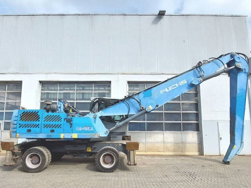 Fuchs MHL 340 E - Stroj za rukovanje otpadom: slika Fuchs MHL 340 E - Stroj za rukovanje otpadom Fuchs MHL 340 E - Stroj za rukovanje otpadom: slika Fuchs MHL 340 E - Stroj za rukovanje otpadom