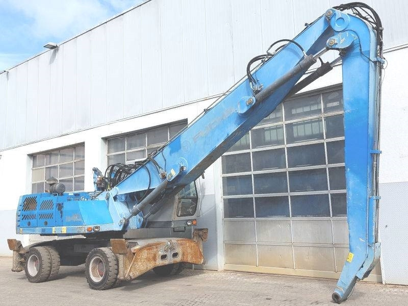 Fuchs MHL 340 E - Stroj za rukovanje otpadom: slika Fuchs MHL 340 E - Stroj za rukovanje otpadom Fuchs MHL 340 E - Stroj za rukovanje otpadom: slika Fuchs MHL 340 E - Stroj za rukovanje otpadom
