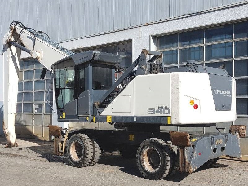 Fuchs MHL 340 F - Stroj za rukovanje otpadom: slika Fuchs MHL 340 F - Stroj za rukovanje otpadom Fuchs MHL 340 F - Stroj za rukovanje otpadom: slika Fuchs MHL 340 F - Stroj za rukovanje otpadom