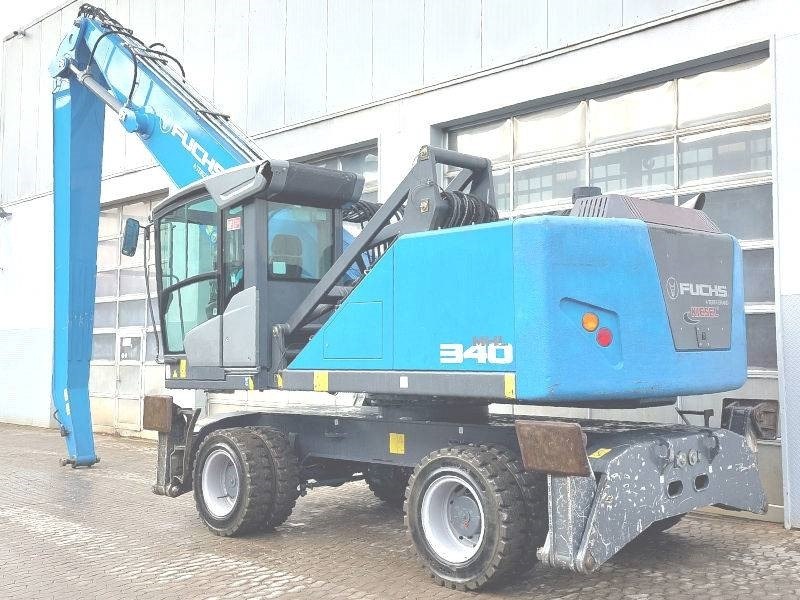 Fuchs MHL 340 F - Stroj za rukovanje otpadom: slika Fuchs MHL 340 F - Stroj za rukovanje otpadom Fuchs MHL 340 F - Stroj za rukovanje otpadom: slika Fuchs MHL 340 F - Stroj za rukovanje otpadom