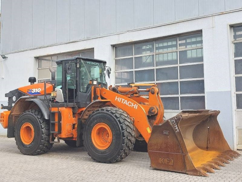 Hitachi ZW 310-6 - Utovarivač na kotačima: slika Hitachi ZW 310-6 - Utovarivač na kotačima Hitachi ZW 310-6 - Utovarivač na kotačima: slika Hitachi ZW 310-6 - Utovarivač na kotačima