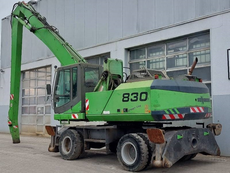 Sennebogen 830 - Stroj za rukovanje otpadom: slika Sennebogen 830 - Stroj za rukovanje otpadom Sennebogen 830 - Stroj za rukovanje otpadom: slika Sennebogen 830 - Stroj za rukovanje otpadom