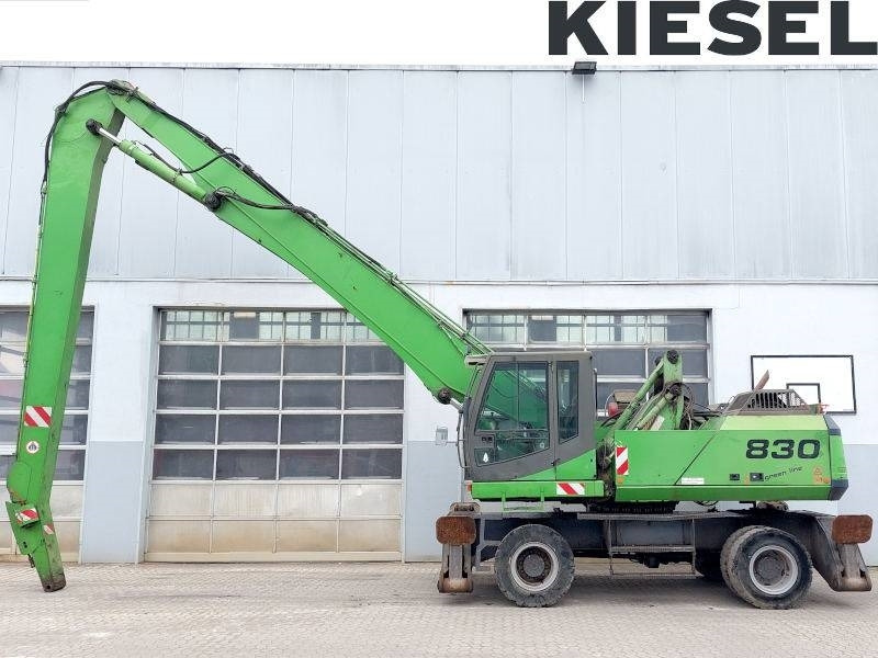 Sennebogen 830 - Stroj za rukovanje otpadom: slika Sennebogen 830 - Stroj za rukovanje otpadom Sennebogen 830 - Stroj za rukovanje otpadom: slika Sennebogen 830 - Stroj za rukovanje otpadom