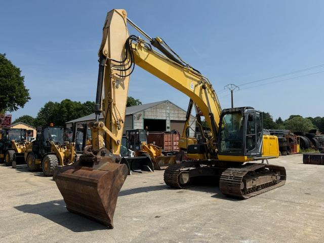 New Holland Kobelco E 215 C - Bager gusjeničar: slika New Holland Kobelco E 215 C - Bager gusjeničar New Holland Kobelco E 215 C - Bager gusjeničar: slika New Holland Kobelco E 215 C - Bager gusjeničar