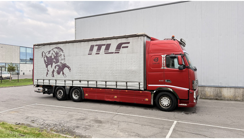 Volvo FH13 540 - Kamion s ceradom: slika Volvo FH13 540 - Kamion s ceradom Volvo FH13 540 - Kamion s ceradom: slika Volvo FH13 540 - Kamion s ceradom