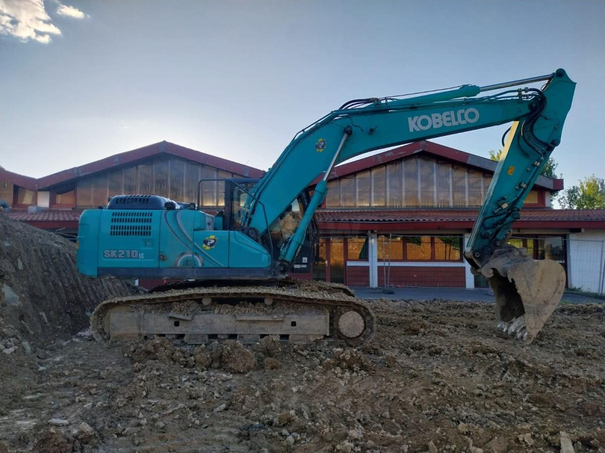 KOBELCO SK210 - Bager gusjeničar: slika KOBELCO SK210 - Bager gusjeničar KOBELCO SK210 - Bager gusjeničar: slika KOBELCO SK210 - Bager gusjeničar