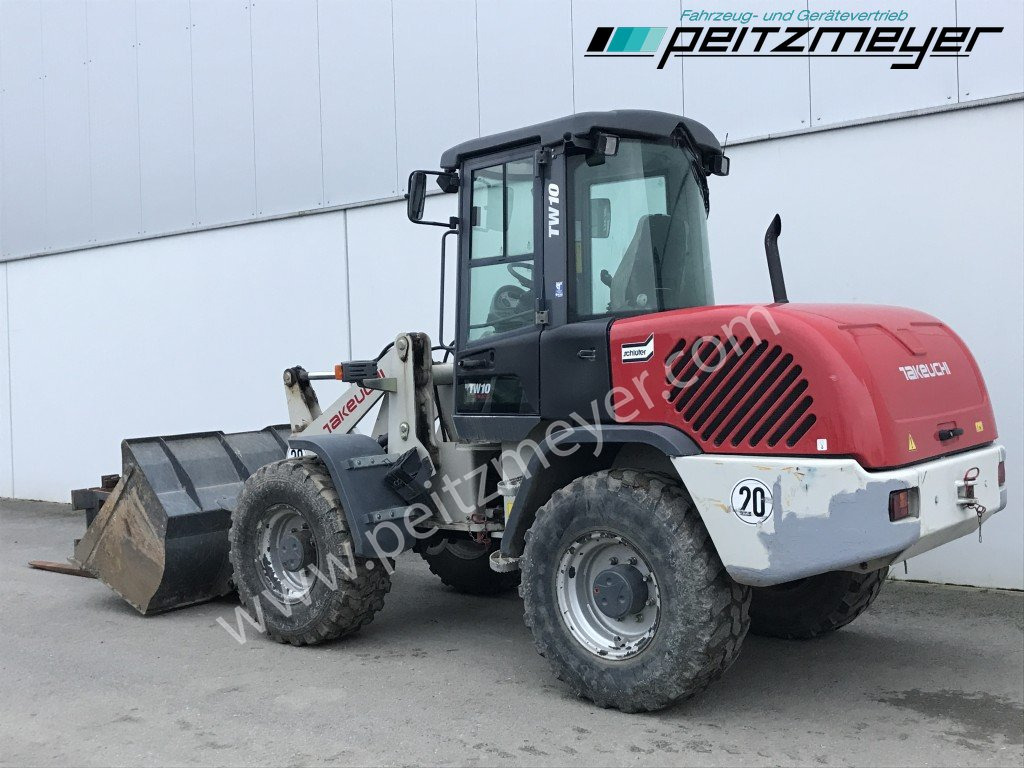 Takeuchi / Terex Radlader TW 10 (ohne Ad-Blue) - Utovarivač na kotačima: slika Takeuchi / Terex Radlader TW 10 (ohne Ad-Blue) - Utovarivač na kotačima Takeuchi / Terex Radlader TW 10 (ohne Ad-Blue) - Utovarivač na kotačima: slika Takeuchi / Terex Radlader TW 10 (ohne Ad-Blue) - Utovarivač na kotačima