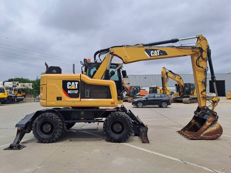 Cat M315F - Bager na kotačima: slika Cat M315F - Bager na kotačima Cat M315F - Bager na kotačima: slika Cat M315F - Bager na kotačima
