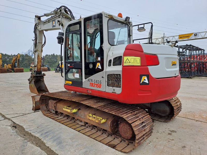 Takeuchi TB2150 - Bager gusjeničar: slika Takeuchi TB2150 - Bager gusjeničar Takeuchi TB2150 - Bager gusjeničar: slika Takeuchi TB2150 - Bager gusjeničar