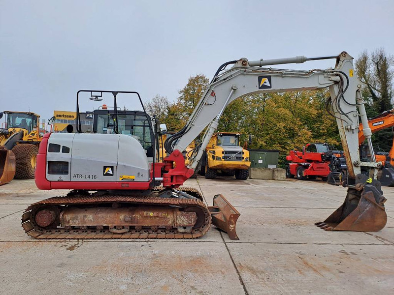 Takeuchi TB2150 - Bager gusjeničar: slika Takeuchi TB2150 - Bager gusjeničar Takeuchi TB2150 - Bager gusjeničar: slika Takeuchi TB2150 - Bager gusjeničar